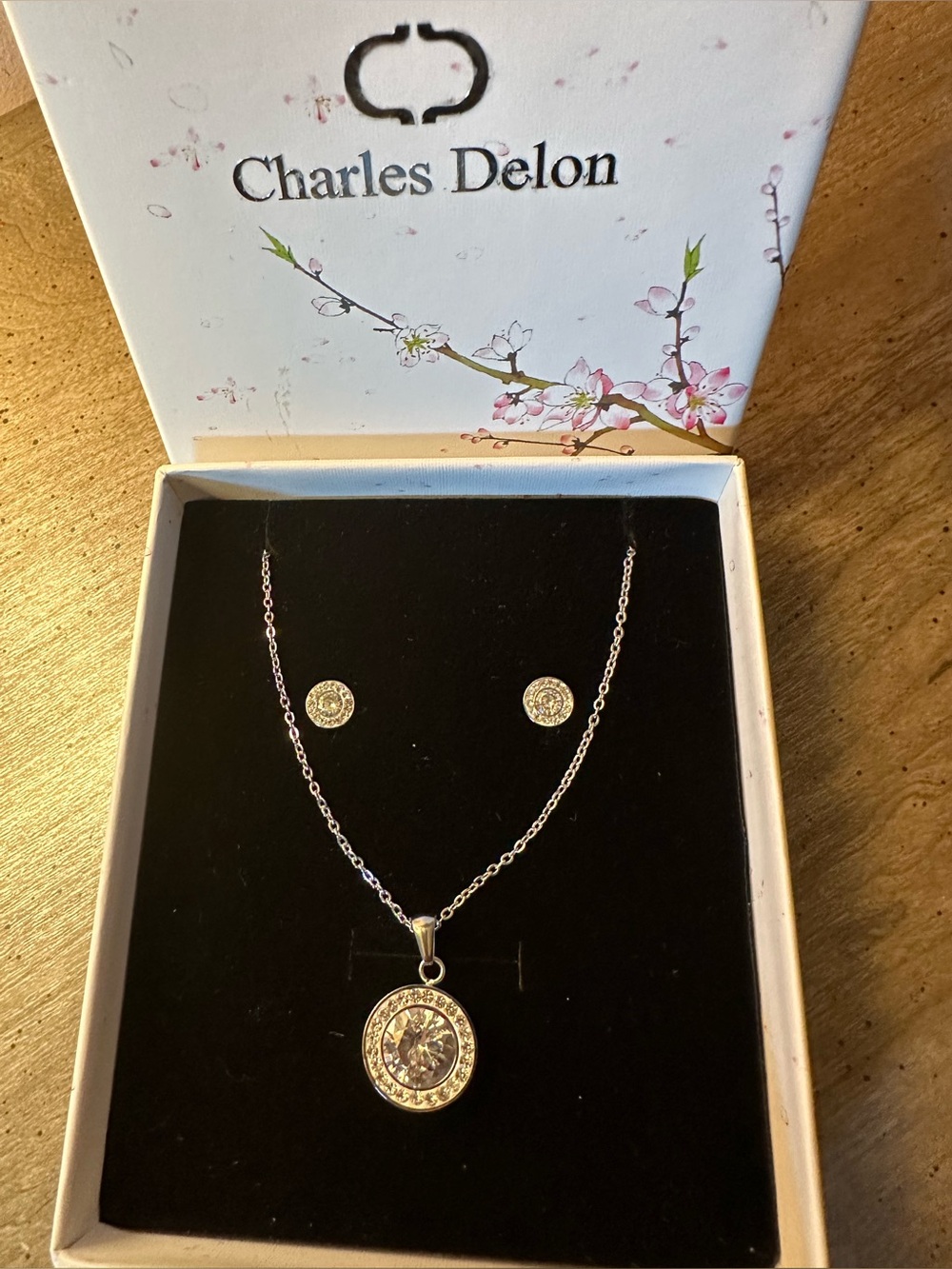 Charles Delon round diamanté pendant necklace and matching earrings.